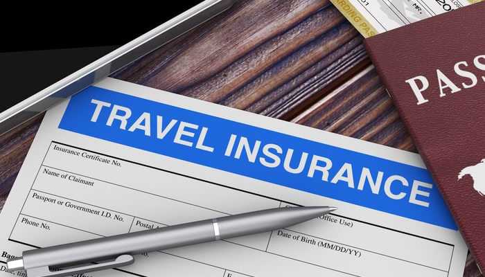 Get the best travel insurance | tycoonstory media Travel insurance form and passport illustrating the importance of thailand travel insurance for safe and secure travel.