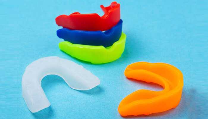Mouthguards | tycoonstory media Colorful mouthguards as essential safety gear for protecting teeth in contact sports