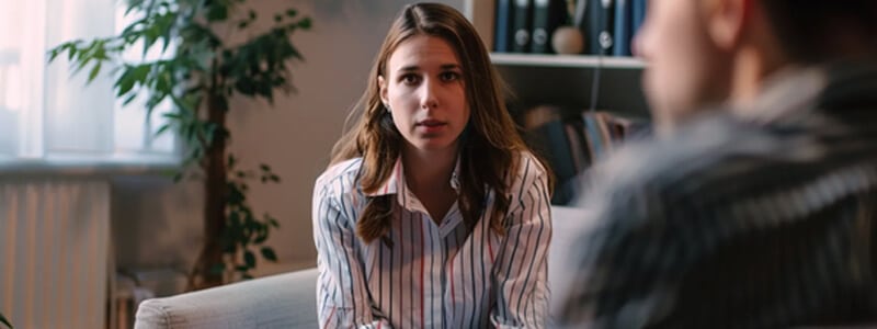 Success of cbt in gambling addiction | tycoonstory media Two women interacting at a casino table, illustrating real-world scenarios addressed through cbt for gambling addiction.