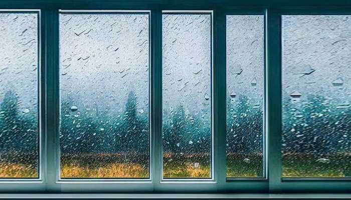 They increase the value of your property | tycoonstory media Heavy rain hitting impact rated windows — showcasing their durability and weather resistance in harsh conditions.