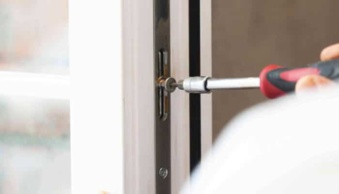 They reduce noise | tycoonstory media Technician installing or adjusting impact rated windows — enhancing home security and storm protection.