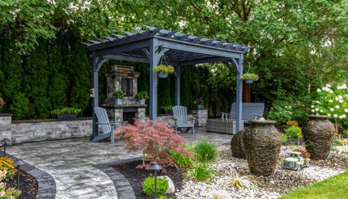 The real differences between gazebos and marquees - tycoonstory | tycoonstory media Gazebos and marquees offering a stylish outdoor retreat with a beautiful pergola, comfortable seating, and lush greenery.