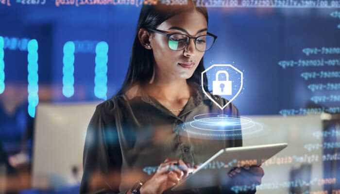 Establish access and entitlement mapping | tycoonstory media A woman using a tablet with virtual data secure icons and digital code overlays, symbolizing cybersecurity and safe data management.