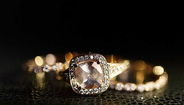 Extensive diamond selection categories | tycoonstory media Elegant halo-set engagement ring from rare carat with a square-cut center diamond and pavé band, symbolizing timeless beauty and style.