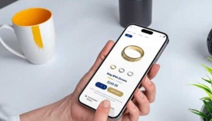 Free ring resizing for a whole year | tycoonstory media Person browsing to buy diamonds and engagement rings online using a mobile app, showcasing a smart and convenient shopping experience.