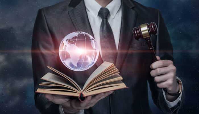 Integrate online cle courses 1 | tycoonstory media Digital transformation of legal education illustrated by a businessman holding a gavel, open book, and a glowing virtual globe.