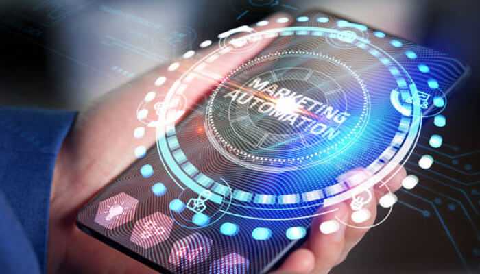 Marketing automation tools | tycoonstory media Modern service business using marketing automation tools on a smartphone, showcasing digital analytics, automation icons, and technology-driven service operations.