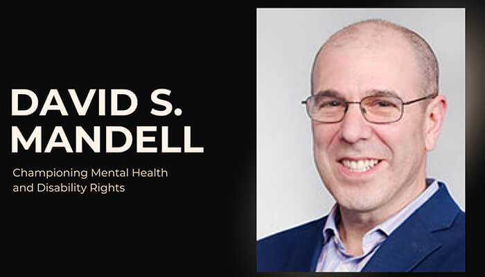 David s. Mandell | tycoonstory media David s. Mandell, championing mental health and disability rights, smiling in a blue blazer.