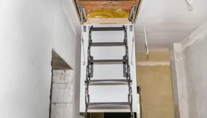 Small details that make a big difference 1 | tycoonstory media Compact foldable attic ladder integrated seamlessly into the ceiling—showing how safety and style don’t have to fight in smart interior design.