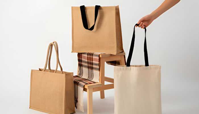 The cost-effectiveness of printed cotton bags 1 | tycoonstory media Displayed printed cotton bags with black handles promoting eco-friendly branding through stylish and sustainable design.