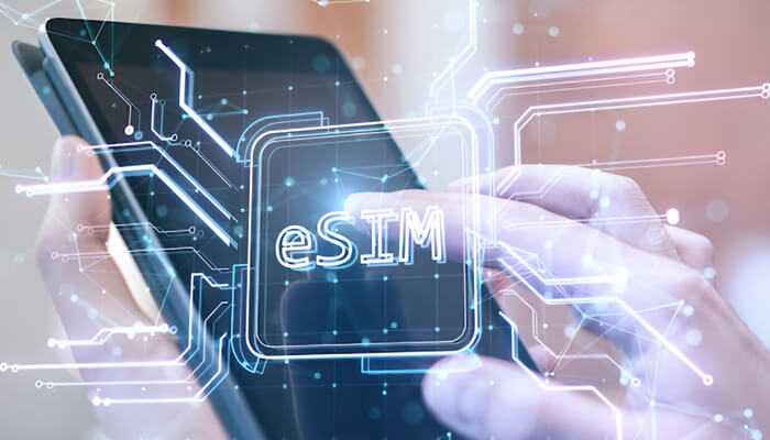 The pitfalls of public wi-fi for solo travellers | tycoonstory media User activating unlimited data esim on a smartphone, showcasing advanced mobile connectivity through embedded sim technology.
