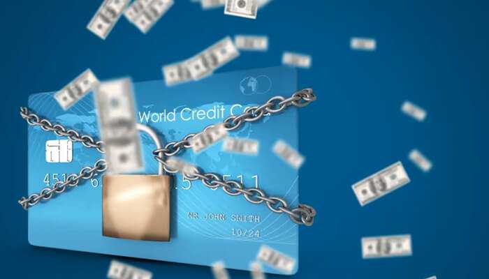 Use credit card protections most shoppers ignore 1 | tycoonstory media Credit card secured with a lock and chain, symbolizing smart credit usage as one of the ways to save money.