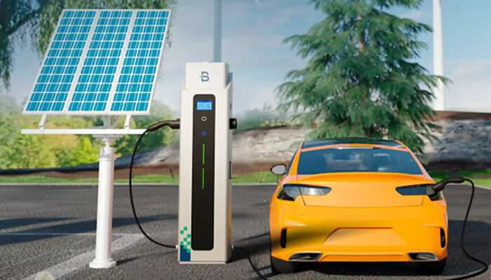 Get your green charging solutions | tycoonstory media An electric vehicle charging at a solar-powered charging station, showcasing the integration of green energy solutions for sustainable transportation.