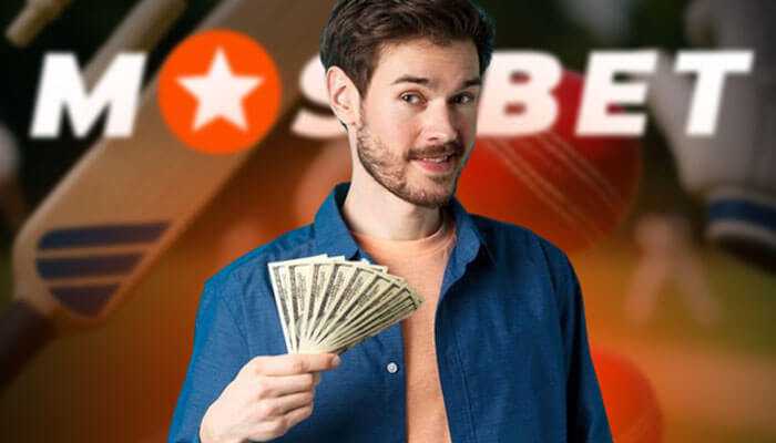 Betting in the mostbet app - tycoonstory | tycoonstory media Man holding a fan of cash in hand with the mostbet logo and cricket-themed background.