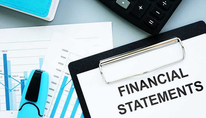 Get comfortable with financial statements - tycoonstory | tycoonstory media Financial statements with charts, calculator, and documents providing financial tips for planning and analysis.