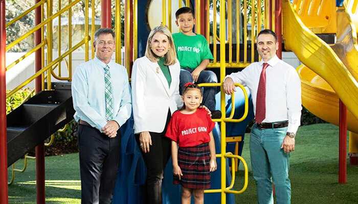 Misha ezrattis net worth a philanthropic partner - tycoonstory | tycoonstory media Misha ezratti with community leaders and children, showing how misha ezratti net worth is tied to philanthropy and florida community development.