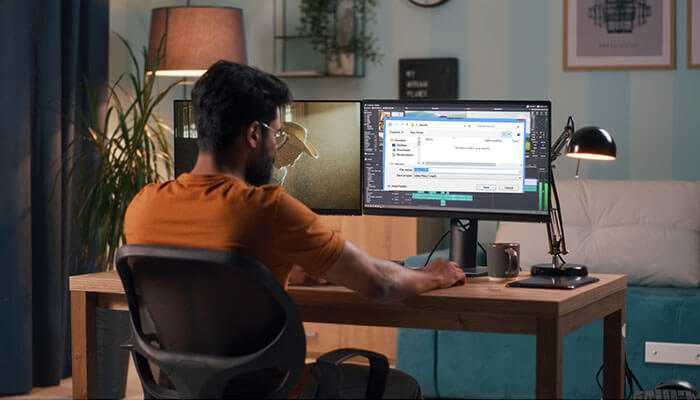 Save the recorded video - tycoonstory | tycoonstory media Man working at desktop computer demonstrating how to screen record on windows using built-in recording tools