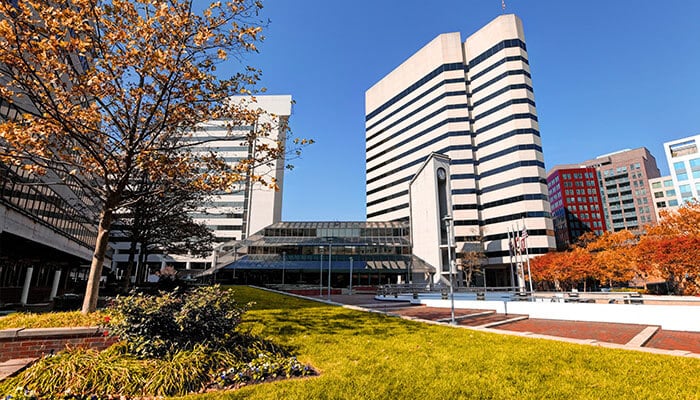 Enjoy a strategic edge - tycoonstory | tycoonstory media Modern office buildings and landscaped public space in downtown bethesda md, showcasing a professional and business-friendly environment.
