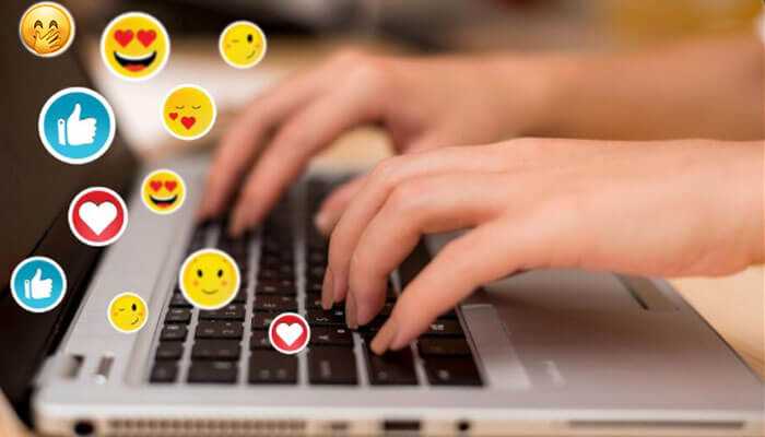 Using character map - tycoonstory | tycoonstory media How to type emojis on chromebook: hands typing on a laptop keyboard surrounded by various emoji reactions.