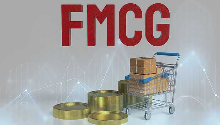 Why fmcg stocks are undervalued in perception - tycoonstory | tycoonstory media Fmcg stocks illustration showing shopping cart with boxes, gold coins, and financial market graph.