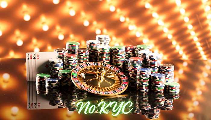 The future of crypto gambling without kyc - tycoonstory | tycoonstory media Stacks of colorful casino chips, a roulette wheel, and playing cards with glowing “no kyc” text, representing anonymous gambling in crypto casinos.