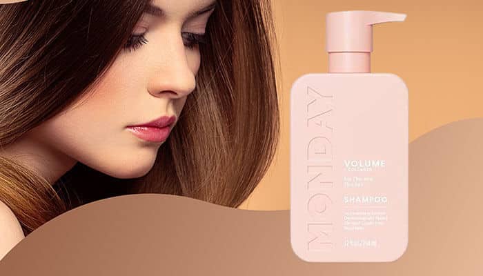 Monday hair volume shampoo - tycoonstory | tycoonstory media Close-up of woman with voluminous brown hair and a monday brand bottle — showcasing one of the best shampoo and conditioner options for adding volume.