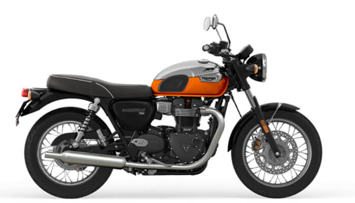 Triumph motorcycle A classic-style triumph motorcycle with an orange and silver fuel tank shown in a side profile view, used to represent details related to the triumph on-road price.