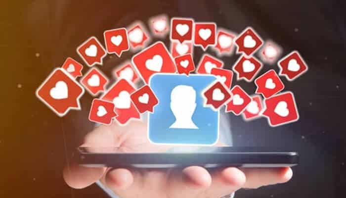 How to spot real instagram likes services | tycoonstory media Real instagram likes represented by authentic user engagement and heart notifications around a profile icon