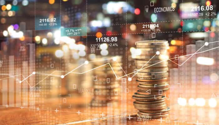 Competitive pricing | tycoonstory media Stacks of coins with digital market graphs and economic data, illustrating investment growth trends in a golden eagle coin review.