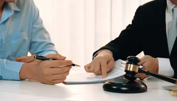 Complex legal procedures | tycoonstory media A group of friends celebrating at a casino, enjoying their wins. For legal help, a personal injury lawyer can guide you through tough times.