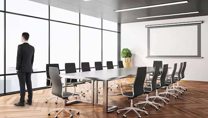 Conference room rental in melbourne A man standing in a conference room rental in melbourne