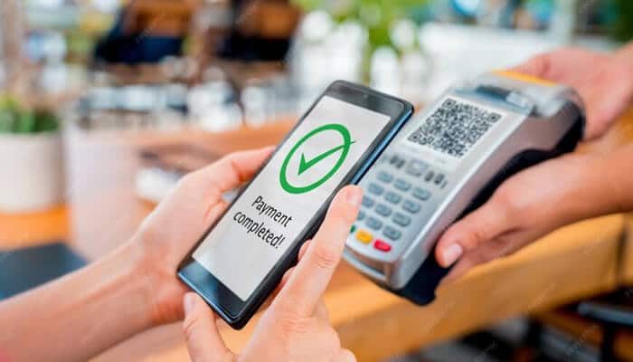 Secure habits to adopt | tycoonstory media Secure upi service shown with a "payment completed" message on a mobile phone, highlighting the ease and security of digital transactions at the point of sale.