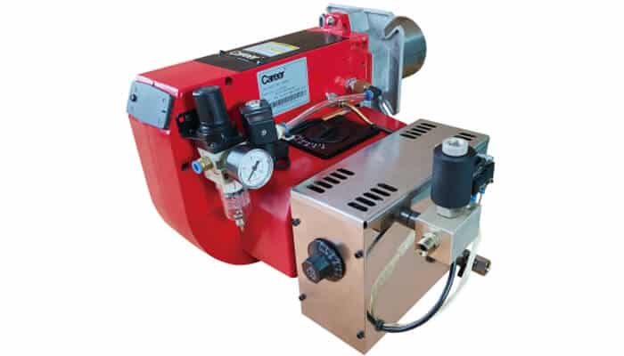 14 | tycoonstory media Industrial burner retrofit system with red combustion burner, pressure gauge, control unit, and fuel regulation components used for upgrading industrial heating equipment.