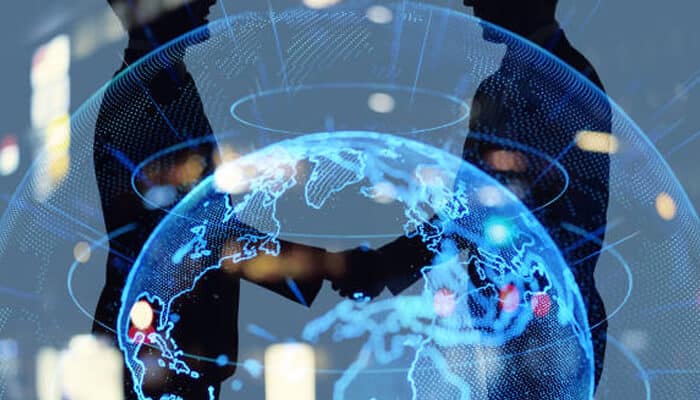 Accelerating innovation through global collaboration | tycoonstory media Global business leader analyzing a digital world map and financial data, symbolizing innovation, cross-border investment, and international funding opportunities.