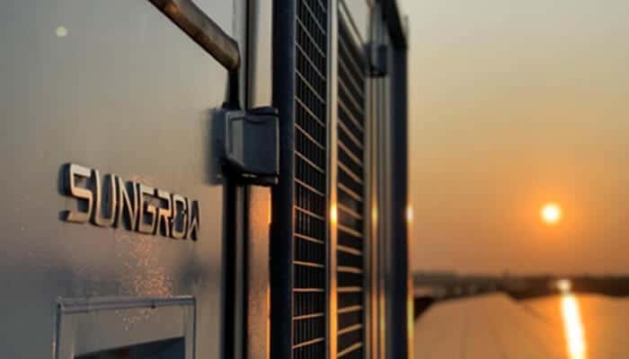 Mastery of complex power environments | tycoonstory media Sunset view of a sungrow energy system, showcasing their commitment to delivering advanced system-level solutions for renewable energy projects.