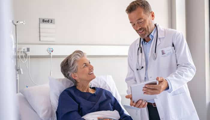 Plan for pain management | tycoonstory media A doctor sharing important pre-surgery tips with a patient in the hospital, ensuring a smoother recovery process and better preparation for the surgery.