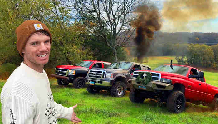 Whistlindiesel with cybertruck 1 | tycoonstory media Whistlindiesel posing with multiple lifted trucks during an extreme automotive stunt filmed for his youtube channel