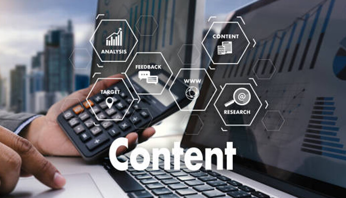 Content metrics plus e e a t | tycoonstory media An individual analyzing data on laptops with a calculator, surrounded by icons like analysis, feedback, and research, emphasizing ai generated content in content strategies.