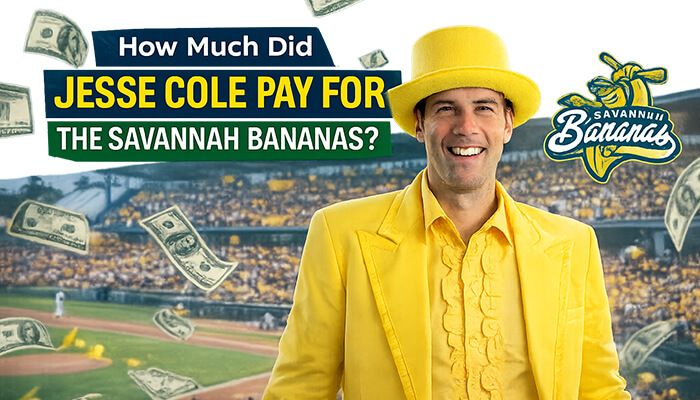 How much do banana ball players make - tycoonstory | tycoonstory media Jesse cole in his signature yellow tuxedo, smiling confidently with a baseball field in the background, symbolizing his entrepreneurial success with the savannah bananas and highlighting his net worth.
