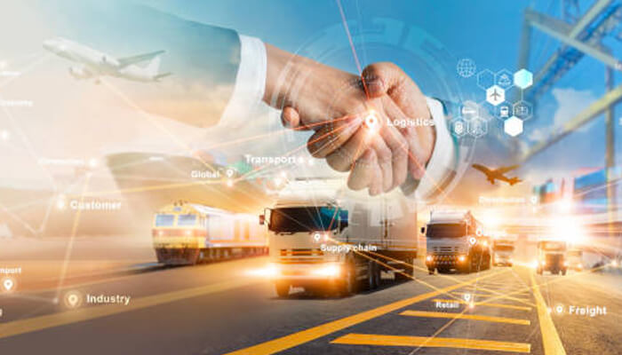 Use strategic shipping and logistics | tycoonstory media A handshake between business partners symbolizing a smooth us-canada shipping experience, with visuals of trucks, trains, and airplanes representing global logistics and supply chain management.