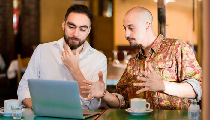 Founders evaluating an adobe commerce partnership | tycoonstory media Founders evaluating an adobe commerce partnership