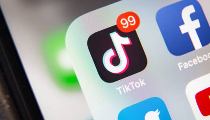 Untitled-1 | tycoonstory media Tiktok app icon with notification badge, illustrating how much does tiktok pay per view earnings and engagement concept.