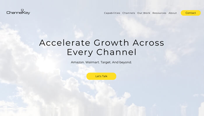 6 1 | tycoonstory media Hero header on a cloudy blue sky with channelkey logo top left, main slogan “accelerate growth across every channel,” subtitle “amazon. Walmart. Target. And beyond. ” and a yellow “let's talk” call-to-action button.