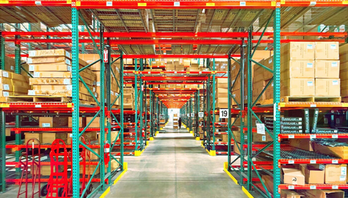 Leveraging third‑party security partnerships | tycoonstory media A well-organized warehouse with rows of products, showcasing the importance of inventory security in ensuring safe and efficient stock management.