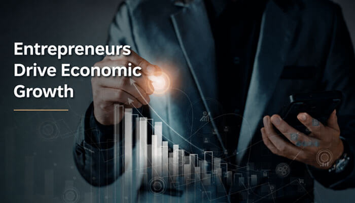 Entrepreneurs drive economic growth - tycoonstory | tycoonstory media Business professional analyzing digital graphs and data to demonstrate what role do entrepreneurs play in economics, highlighting their impact on economic growth, innovation, and market development.
