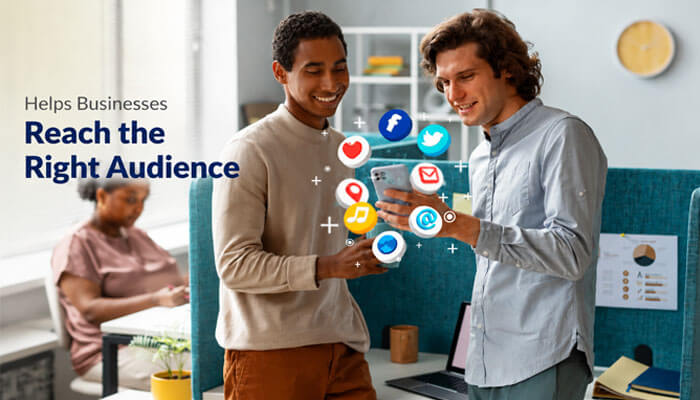 Helps businesses reach the right audience - tycoonstory | tycoonstory media Benefits of social media for business showing two professionals using a smartphone with floating social media icons like facebook, twitter, instagram, and email to reach the right target audience effectively.
