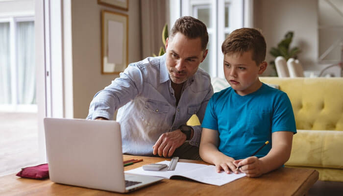 How parents can support young entrepreneurs - tycoonstory | tycoonstory media Parent mentoring a child entrepreneur while planning a small business project for the kids entrepreneur market.