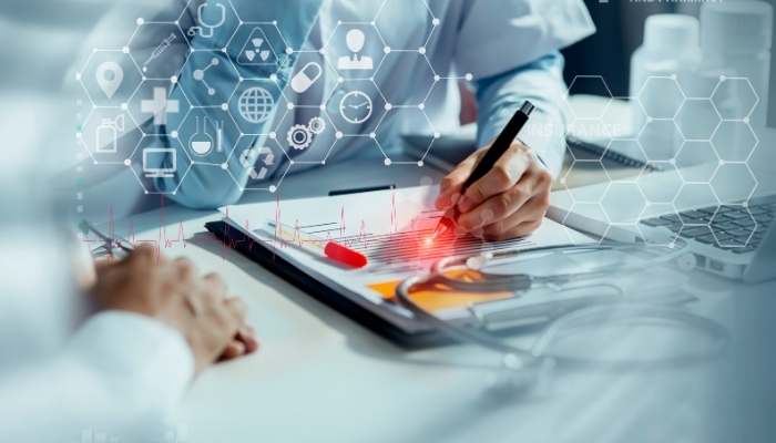 How technology is supporting the best interests of patients | tycoonstory media Doctor reviewing digital health data and patient records to improve care across america’s healthcare system.