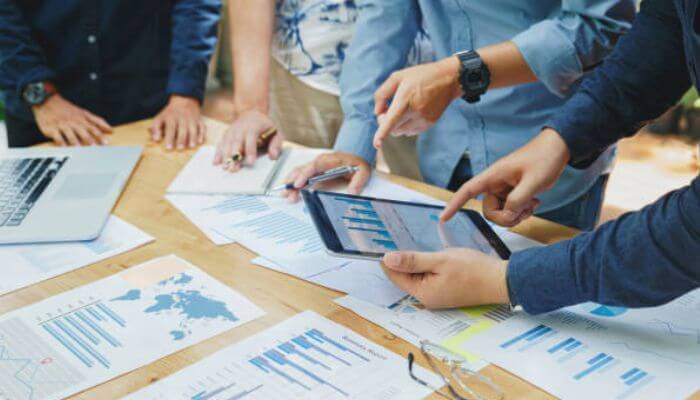 Seo strategy for different types of accounting firms 1 | tycoonstory media Seo for accounting firms team analyzing financial data, reports, and digital marketing performance
