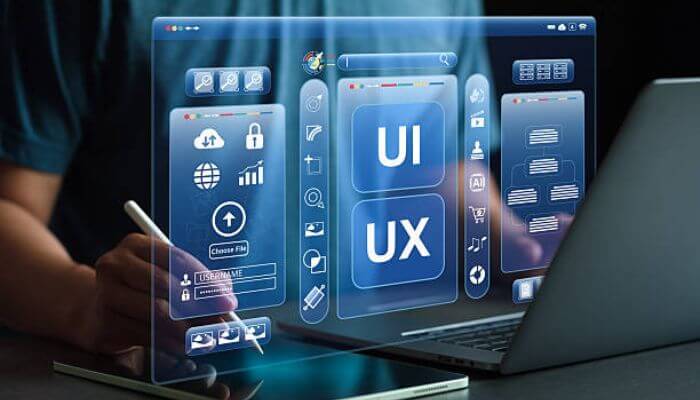 Types of software architecture for startups 1 | tycoonstory media Custom software development for startups ui ux design interface shown on a digital screen with app development tools and laptop.